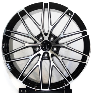 Silver machined multi-spoke alloy rim with black accents and premium mag wheel design