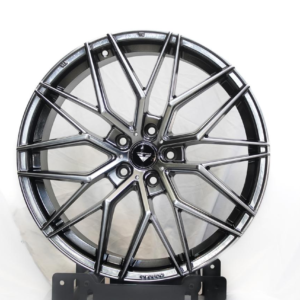 Gloss black multi-spoke alloy rim with polished face and premium mag wheel design.
