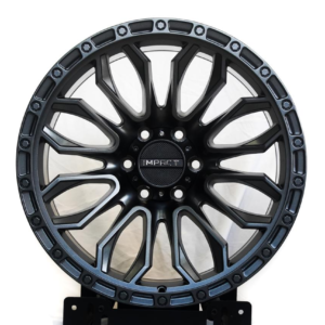 Black and silver multi-spoke alloy rim with beadlock-style design, premium off-road mag wheel.