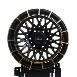 black mesh-style alloy rim with detailed multi-spoke design, premium mag wheel.